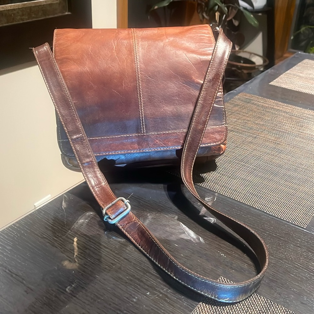 Jack George's Leather Crossbody 10x10 adjustable leather strap.